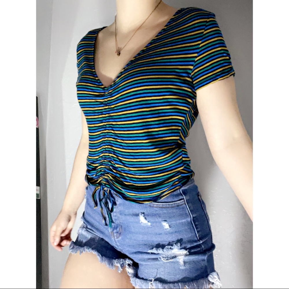 Forever 21 size large adjustable green, blue and yellow top. In great condition.